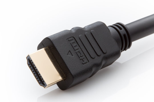 HDMI cable connector with gold end on white background