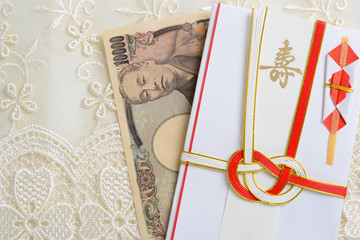 祝儀袋と一万円札