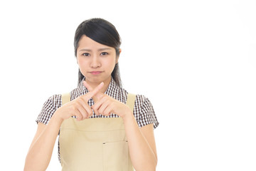 禁止の意思表示をする主婦