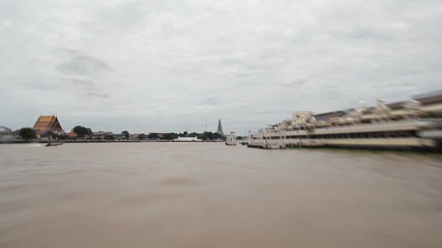 Boat driving time lapse on Chao Phraya river in Bangkok