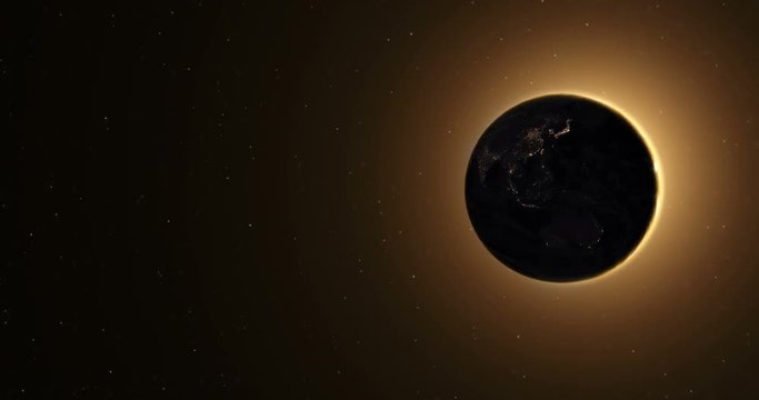 Sun illuminating at sunrise planet earth in the space