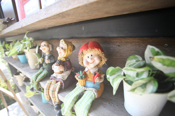 Doll sculpture on wood shelf Vintage Style 