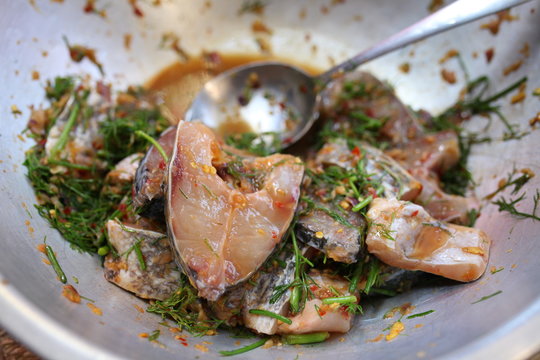 Raw fish mixed with thai herbs and chili ,Esan Thailand Food.
