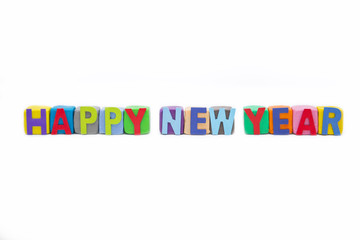 word Happy New Year by wooden letter on clay