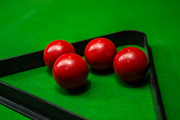 Snooker ball on green table background