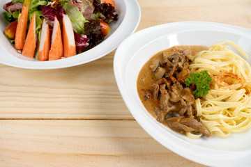 spaghetti meat sauce  with crab salad