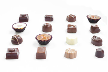 Chocolate candy set on white background.