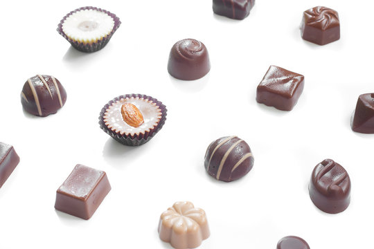 Chocolate candy set on white background.