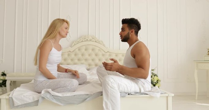 couple relationships problem fight conflict sitting on bed argue unhappy woman hit man negative emotion