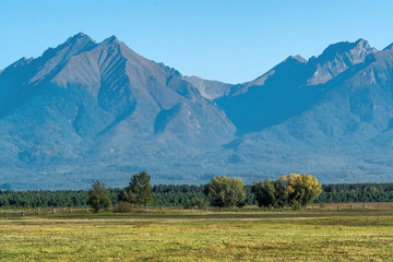 View to the mountain range of the Eastern Sayan - obrazy, fototapety, plakaty