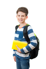 A schoolboy with book and backpack isolated on white background