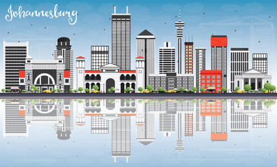 Obraz premium Johannesburg Skyline with Gray Buildings, Blue Sky and Reflection