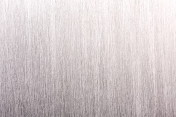 textured background pattern of brushed grey industrial metal plate