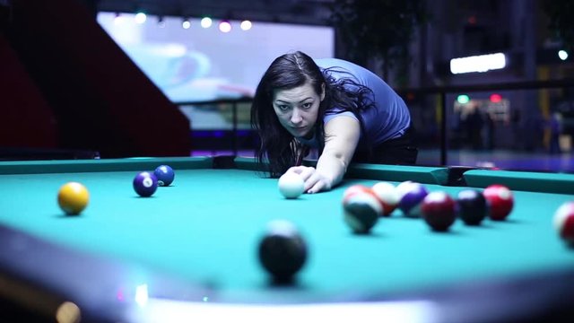 Woman Gets The Ball In The Pocket Billiards