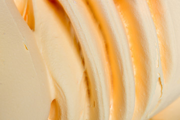 Close up of whipped orange cream.