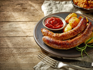 grilled sausages on dark plate