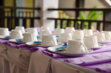 Coffee cup upside down as it prepared to put on the table.