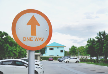 one way board in parking background