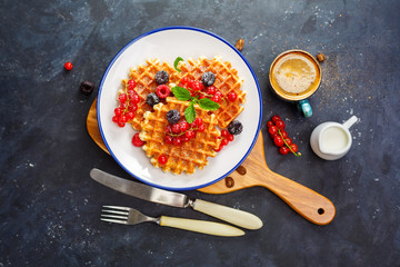 Waffles with fresh berries and honey
