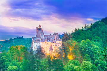 Naklejka premium Sunset light over medieval dracula Bran castle in Brasov, Transylvania, Romania