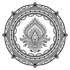 A circular pattern in the form of a mandala.Henna tattoo flower template in Indian style. Ethnic  floral paisley - Lotus. Mehndi style. Decorative pattern in oriental style.
