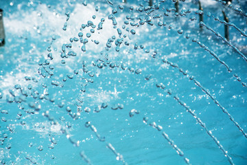 water drops in the air. Blurred soft abstract background. drop fountain.