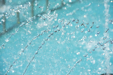water drops in the air. Blurred soft abstract background. drop fountain.