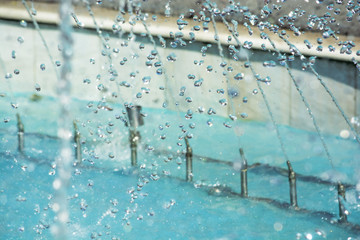 water drops in the air. Blurred soft abstract background. drop fountain.