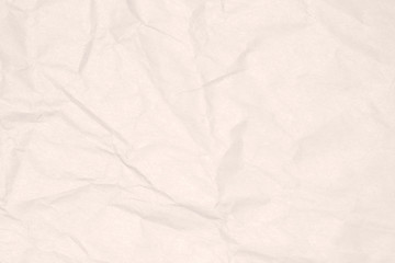 Recycled crumpled light brown paper texture or paper background for design with copy space for text or image.