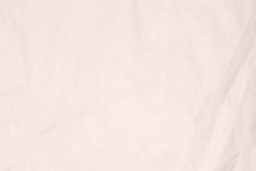 Recycled crumpled light brown paper texture or paper background for design with copy space for text or image.