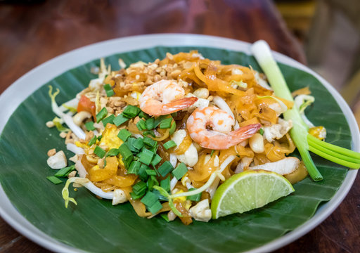 Pad thai, Phat thai, is a stir-fried rice noodle dish commonly served as a street food popular and at casual local eateries in Thailand