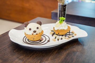 Nutella cookie cup ice cream panda on chocolate decor dish
