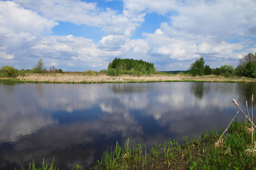 Fototapeta na wymiar reflection of the sky in the river