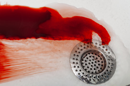 Blood Washing Down The Drain Representing A Suicide Or Homicide Attempt