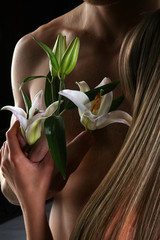 white lily in the hands