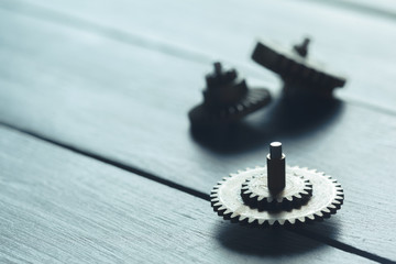 gears on the dark wooden background