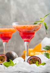 Alcoholic cocktail with fresh passion fruit