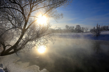 Fototapeta na wymiar fog over winter river
