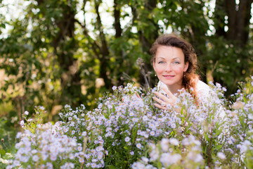 Nice girl and flowers in a nice day