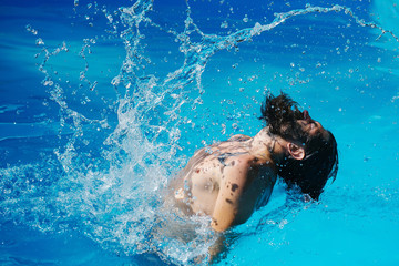 bearded man in swimming pool