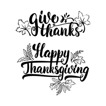Give thanks and Happy Thanksgiving - lettering calligraphy phrase with leaves. Autumn greeting card isolated on the white background.
