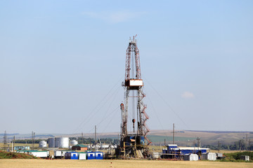 Naklejka premium drilling rig in the field