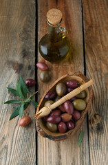 Olives in a bowl with spices oregano