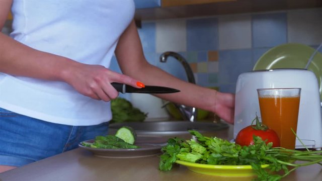 Woman making healthy meal in the kitchen.
