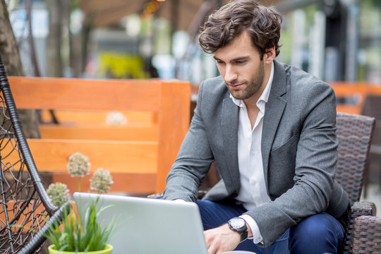 A handsome young man on the terrace