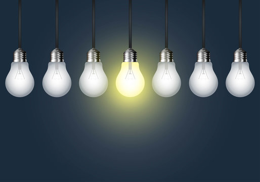 Hanging light bulb on a dark background. Idea concept. Vector