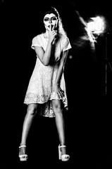 Halloween face-art girl with 
yellow eyes  