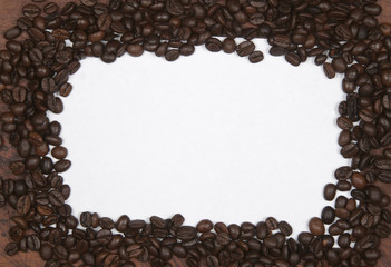 Coffee seeds frame border background. Top view.