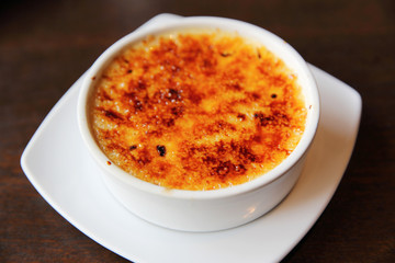 Creme Brulee on wood background