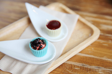 white chocolate with strawberry sauce